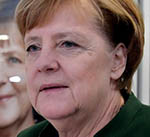 Merkel Vows ‘Serious’ Coalition  Talks with SPD